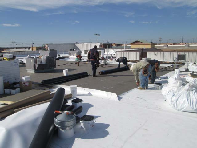 TPO Roof being Installed - Thermoplastic Polyolefin - Nelson Roofing Company