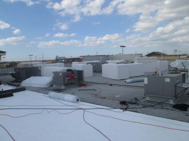 TPO Roof being Installed - Thermoplastic Polyolefin - Nelson Roofing Company