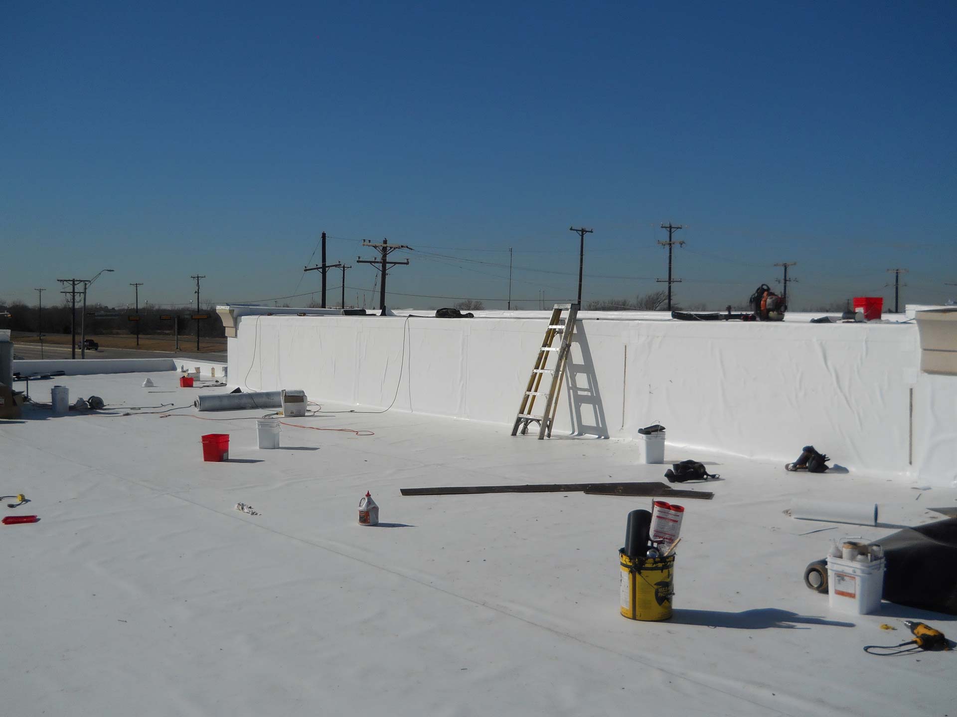 TPO Roof being Installed - Thermoplastic Polyolefin - Nelson Roofing Company